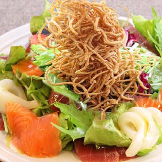 Fried noodle salad with seafood seaweed