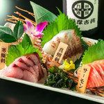 Assortment of three types of fresh fish sashimi