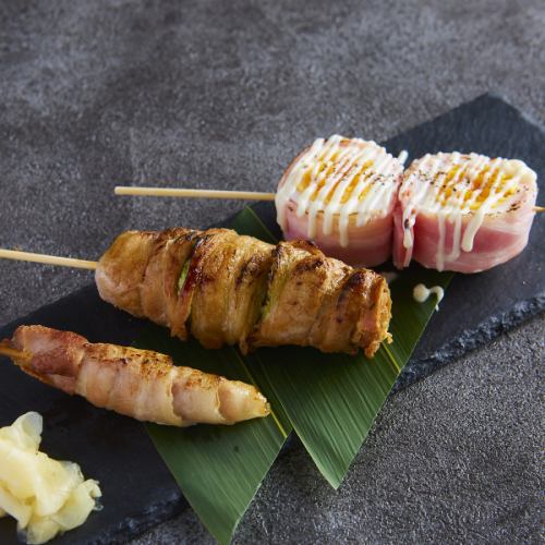 Assortment of 3 types of skewers (soft-boiled egg, pork roll, gari pork)