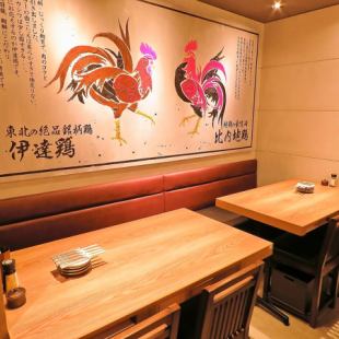 A table seat on one side of the sofa with a powerful picture of an exquisite brand chicken.Please enjoy our specialty chicken dishes!