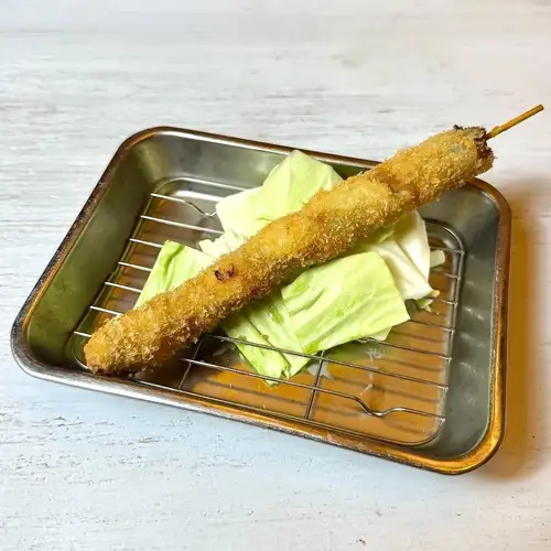 Asparagus wrapped in pork
