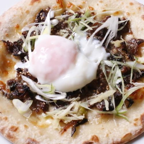 Japanese-style teriyaki pizza with beef tendon and soft-boiled egg