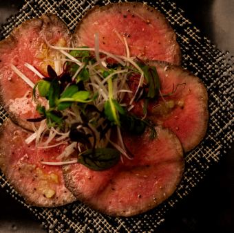 Black tongue carpaccio with fermented salt and lemon