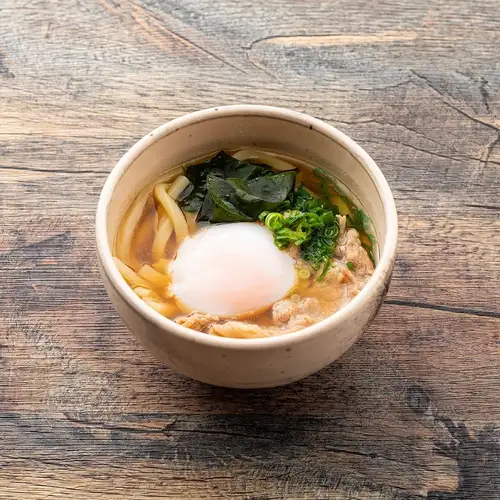 Soft-boiled egg and meat udon