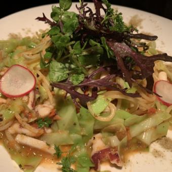 Anchovy pasta with swordtip squid and fresh tomatoes