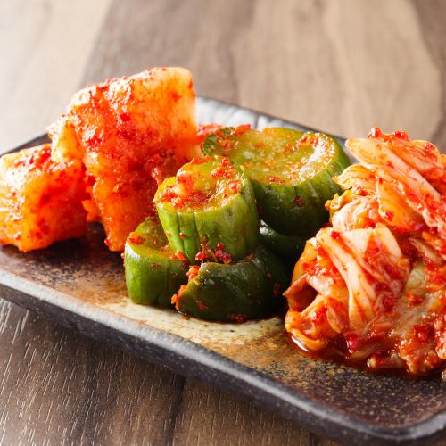 Three kinds of kimchi served