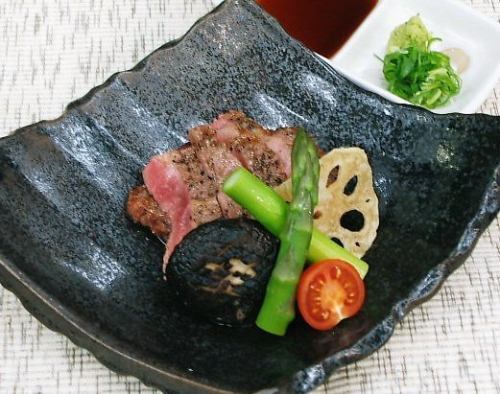 Grilled beef loin served with wasabi soy sauce