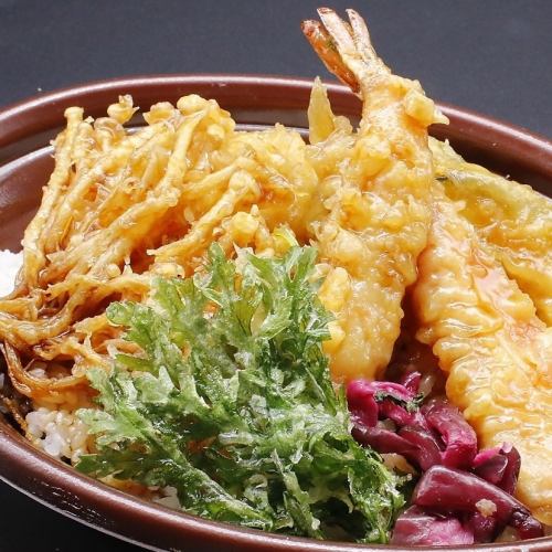 Bowl of rice and fried fish