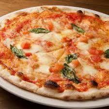 Special pizza with fresh tomatoes and basil