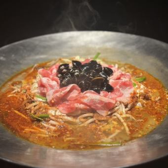 Clam and meat stew with spicy mala sauce