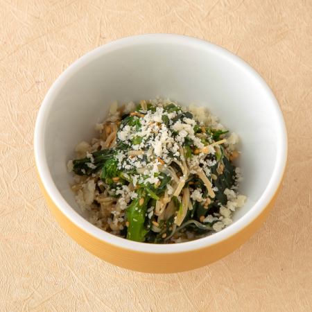 Parmigiano Reggiano and spinach with sesame seeds
