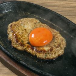 Tsukimi meatballs grilled on an iron plate