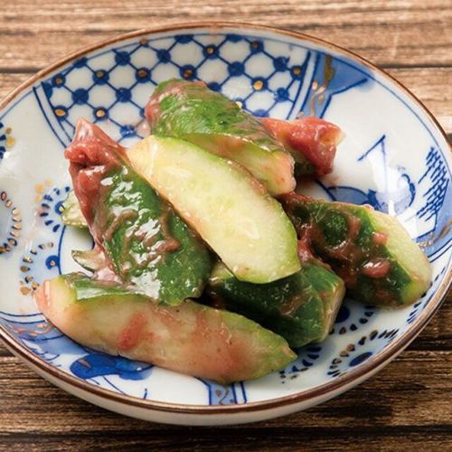 Shredded cucumber with plum dressing