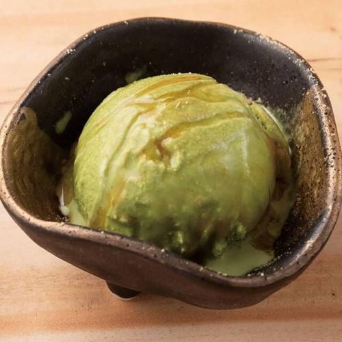Matcha ice cream with brown sugar syrup and kinako (roasted soybean flour)