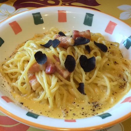 Carbonara with black truffle and bacon