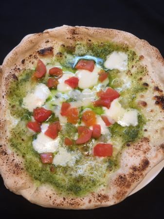 Genovese and fresh tomato pizza