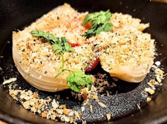 Grilled onion with herbal breadcrumbs