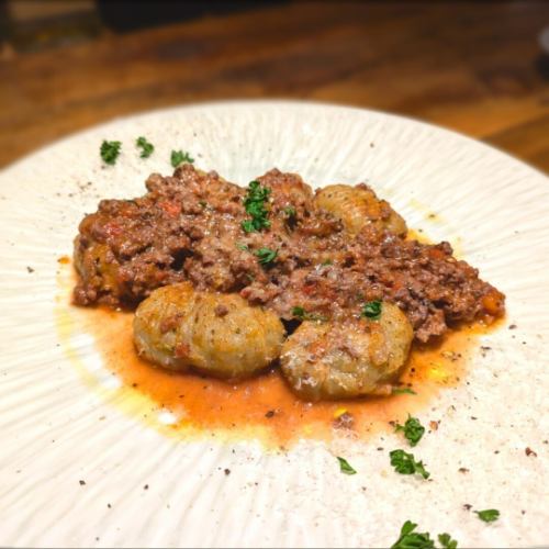 Handmade autumn eggplant gnocchi with Bolognese meat sauce