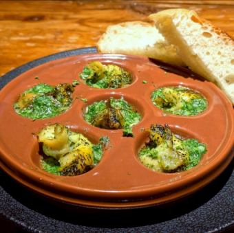 Lighthouse whelk with herb butter, escargot style