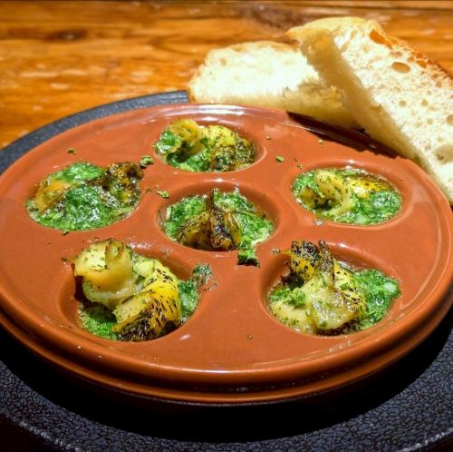 Lighthouse whelk with herb butter, escargot style