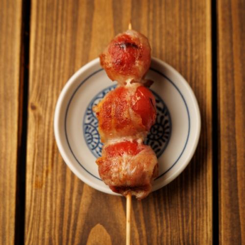 Meat wrapped tomato