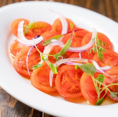 Marinated ripe tomatoes