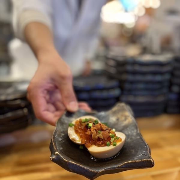 Fresh seafood is lined up on the counter! We purchase fresh fish caught early in the morning, cook it to perfection, and serve it to our customers!