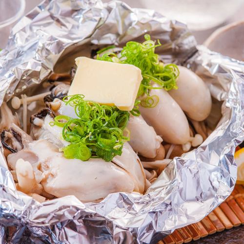 Oysters grilled in butter foil