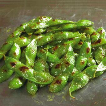 Grilled edamame with butter and soy sauce