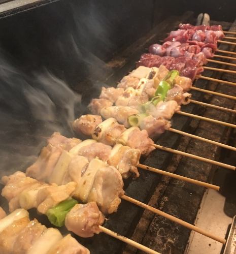 Our signature charcoal-grilled chicken skewers start at 100 yen each.