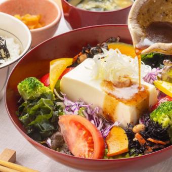 Japanese-style salad bowl with chilled tofu and seaweed and shiso and hijiki rice