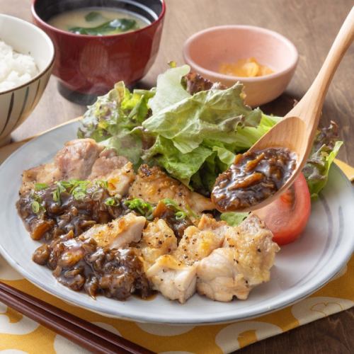 Charbroiled chicken thighs with moromi mushroom sauce, served with grated yuzu