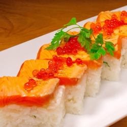 Grilled salmon pressed sushi