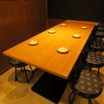 Semi-private room style table seats for 6 people separated by partitions up to 12 people!