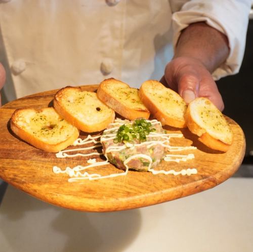 名物!ねぎとろガーリックトースト