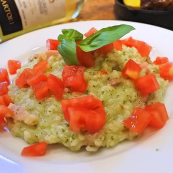 Genovese risotto with tomatoes sprinkled like rain