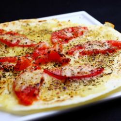 Tomato pizza with tortilla dough