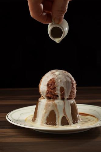 Homemade chocolate pudding with ice cream