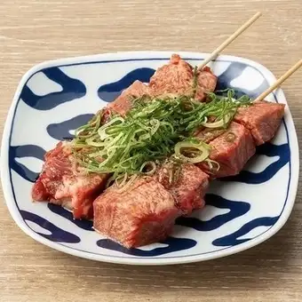 Green onion and salted beef tongue skewers