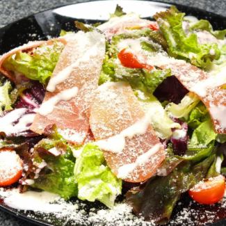 Caesar salad with soft-boiled egg and aged prosciutto
