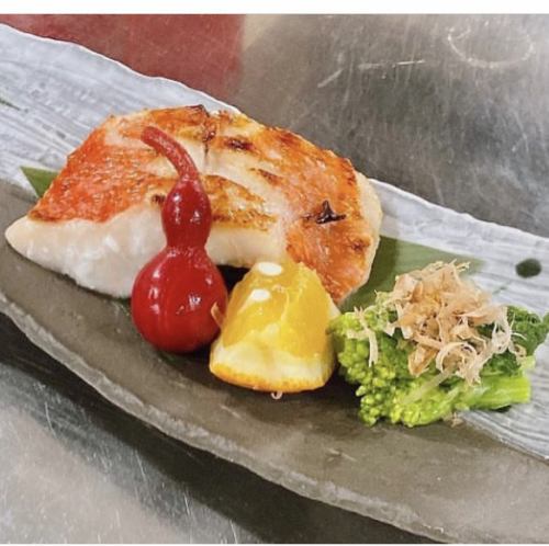 Charcoal grilled golden eye snapper