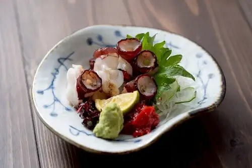 Freshly grilled chunks of live octopus from Aomori.
