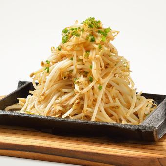 Fried bean sprouts with black pepper on a hot plate