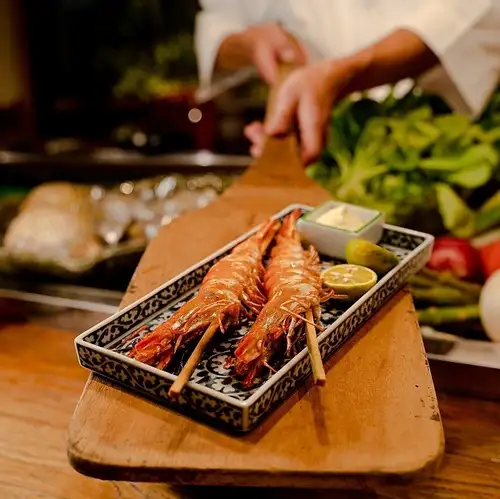 Hiroshima's specialty is "Genshiyaki," a style of slow-cooking using local ingredients.