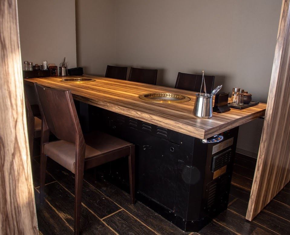 We have private rooms that can accommodate up to 7 to 12 people, and semi-private rooms for small groups.