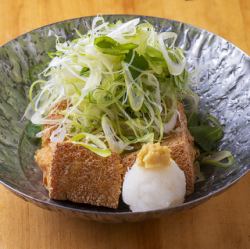 Deep-fried tofu covered in green onions