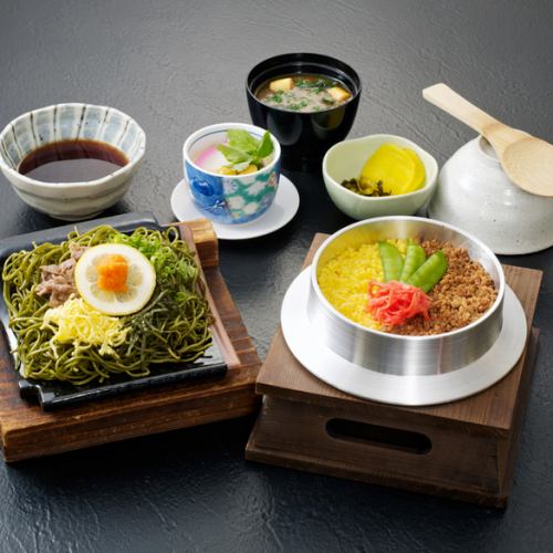 A meal of rice cooked in a pot and soba noodles
