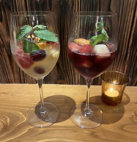 Homemade sangria with lots of frozen fruits