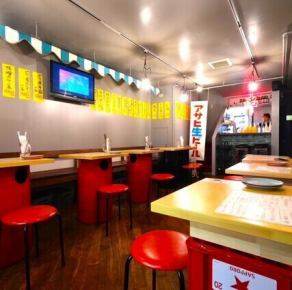 Table seating is also available.It's a lively space where everyone can have fun.