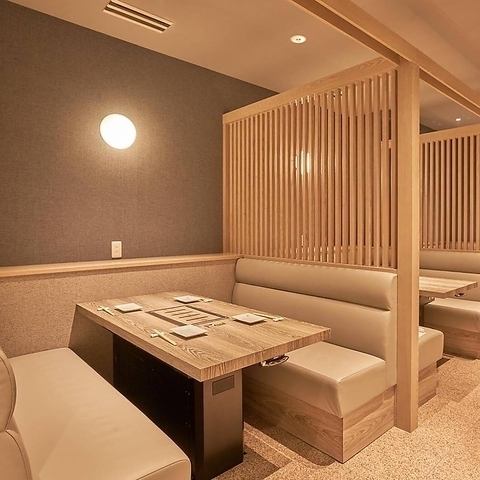 The interior of the store has a warm and calm atmosphere with a wood motif.